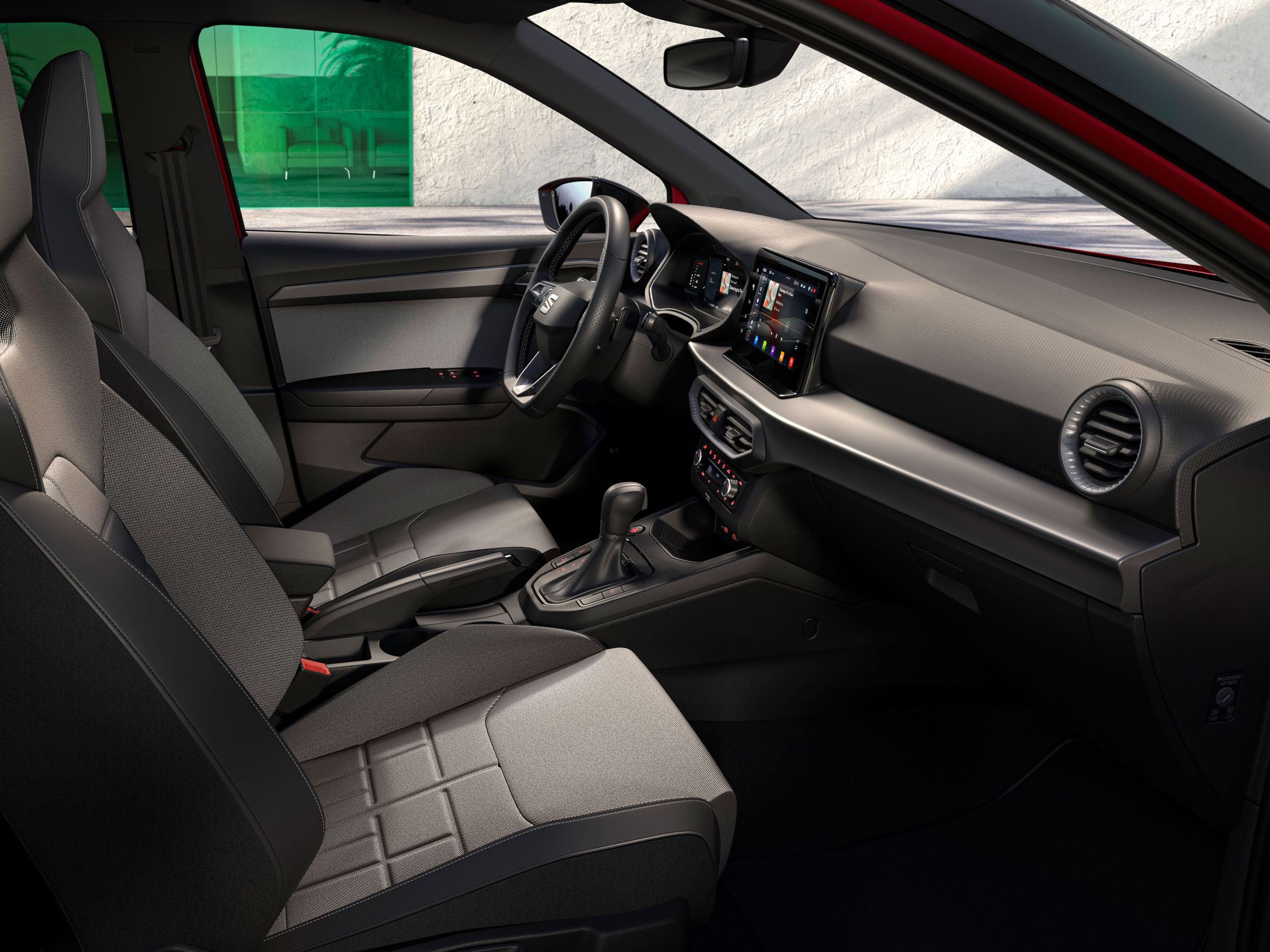 Innenraumdetails des SEAT Arona, einschließlich geprägter Sportsitze für FR in Nuance Schwarz